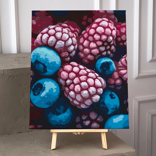 Stylized painting of frozen raspberries and blueberries in vibrant colors