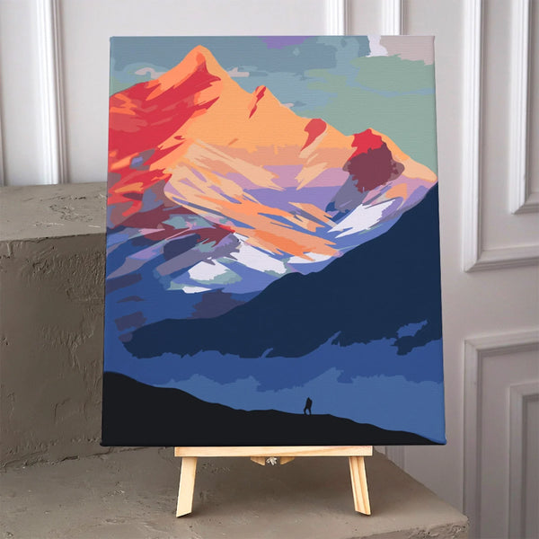 Stylized painting of a majestic mountain with a lone hiker