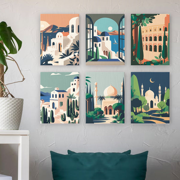 Stylish wall display of finished canvases from the Wanderlust Wonders Paint By Numbers set of 6.