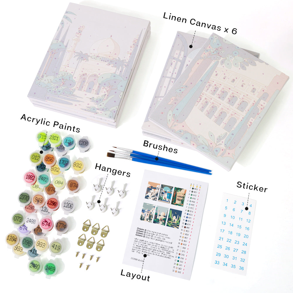 Wanderlust Wonders set with linen canvas, acrylic paints, brushes, hangers, stickers, and layout.